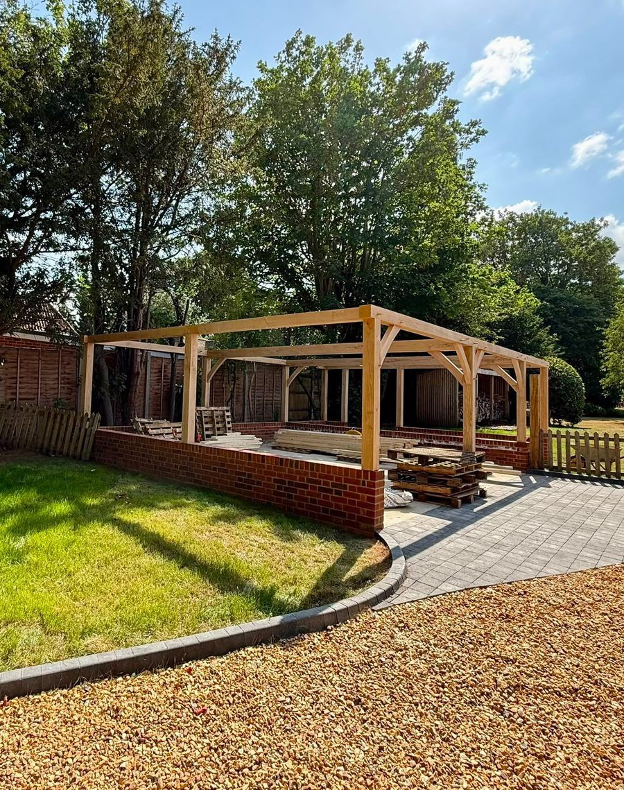 Oak carport frame under construction, Knebworth