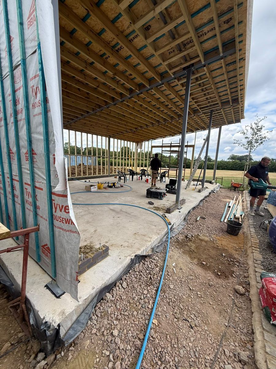 Steel garage frame under construction, Rabley Heath, Welwyn